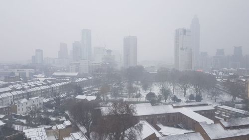 Aerial view of cityscape during winter