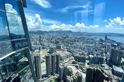 High angle view of buildings in city against sky