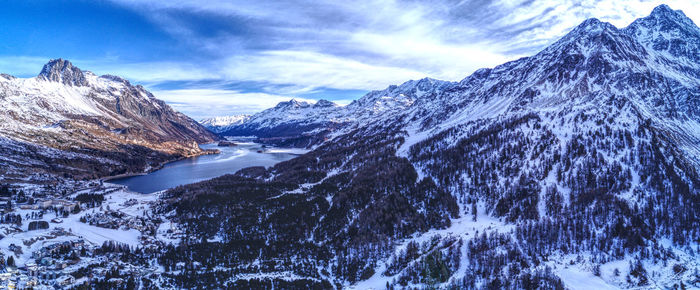 Scenic view of snowcapped mountains against sky