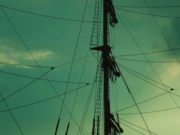 Low angle view of mast against sky