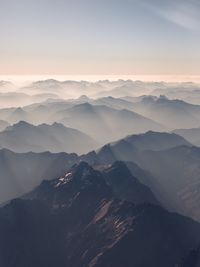 Scenic view of mountains against sky during sunset