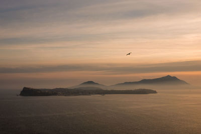 Scenic view of sea against sky during sunset