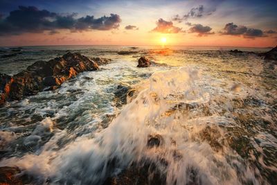 Scenic view of sea against sky during sunset
