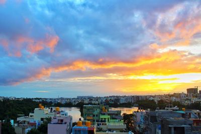 High angle view of townscape against sky during sunset