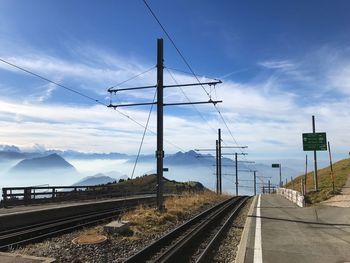 Train on railroad track against sky