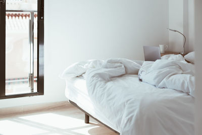 White bed in bedroom at home