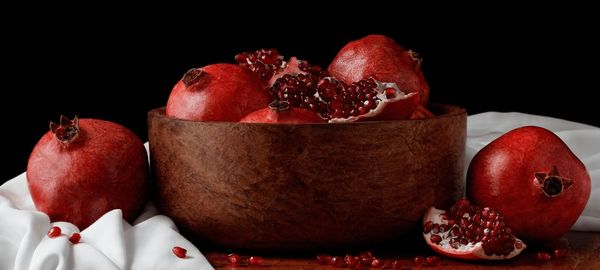 Close-up of fruits in bowl on table