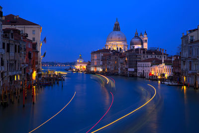 City lit up at waterfront