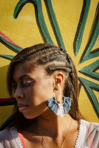 Portrait of young woman looking away