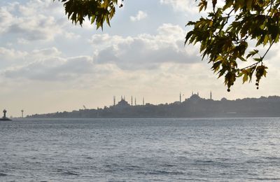 View of buildings against cloudy sky