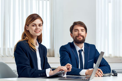 Portrait of smiling young couple