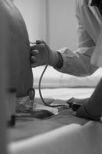 Close-up of hands working on table