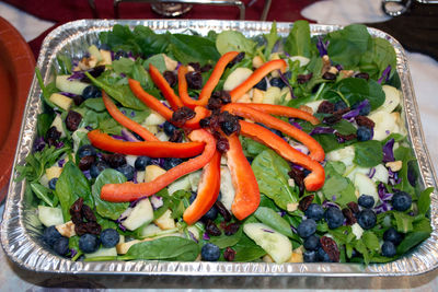 High angle view of fruit salad in container