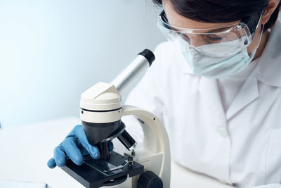 Female dentist working in laboratory