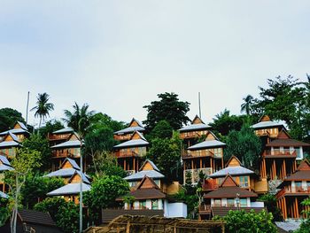 Hotel and buildings against sky