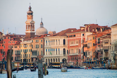 View of buildings in city against clear sky