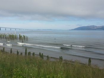 Scenic view of beach against sky