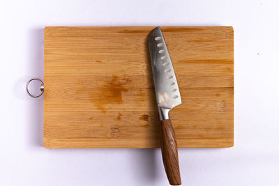 High angle view of wood on table against white background