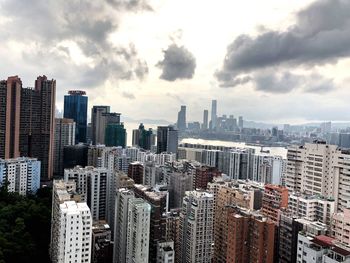 Modern buildings in city against sky