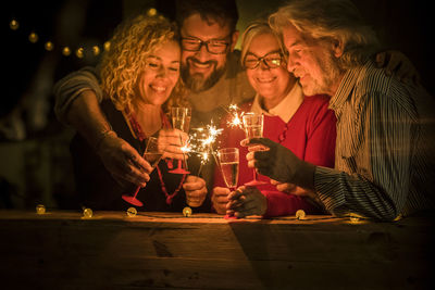 Group of people at illuminated table