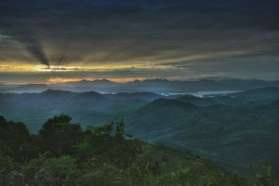 Scenic view of landscape against sky during sunset