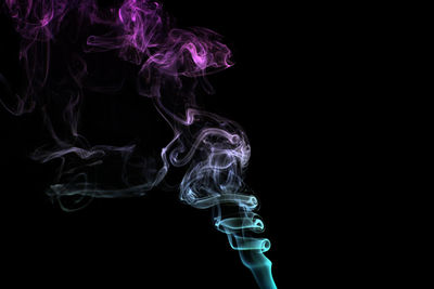 Close-up of smoke against black background