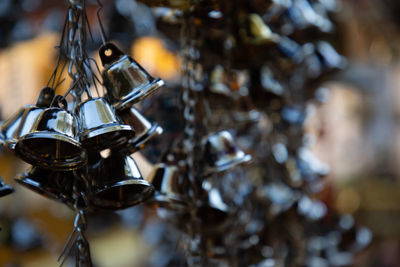 Close-up of metal hanging outdoors