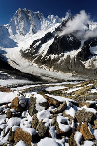 Scenic view of aiguille de rochefort covered with snow during winter