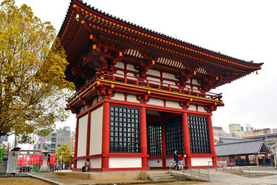 View of pagoda against sky in city