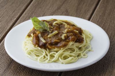 Close-up of noodles served in plate