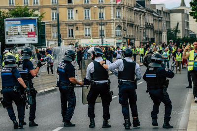 Group of people on street in city