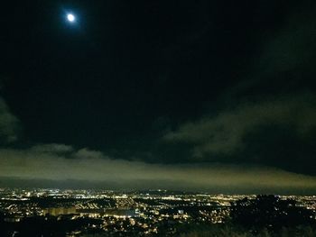 Aerial view of city at night