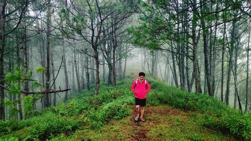 Man walking in forest