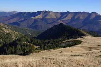 Scenic view of mountains against clear sky