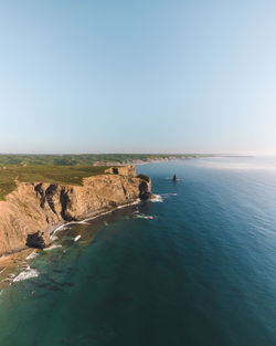 Scenic view of sea against clear sky