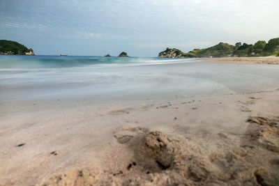 Scenic view of beach against sky
