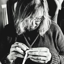 Close-up of woman holding mobile phone
