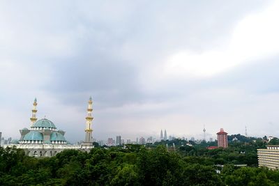 City against cloudy sky