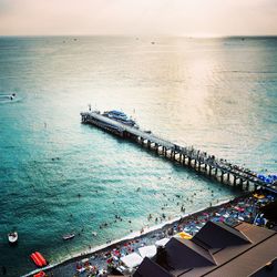 High angle view of pier by sea against sky