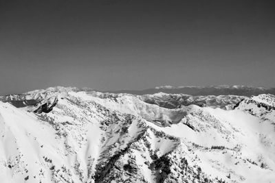 Scenic view of snow covered mountains