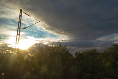 Low angle view of cloudy sky at sunset