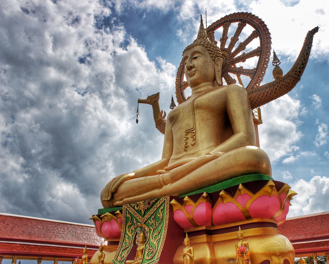 LOW ANGLE VIEW OF STATUE OF BUDDHA AGAINST SKY