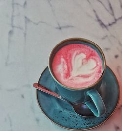 High angle view of coffee cup on table