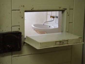 Sink seen through open window at prison