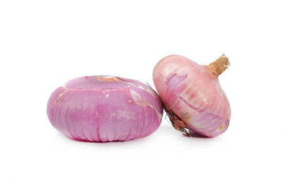 Close-up of garlic on white background