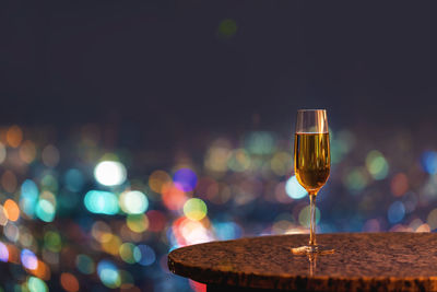 Close-up of wine glass on table