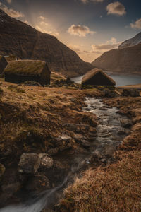 Scenic view of rocks in mountains against sky