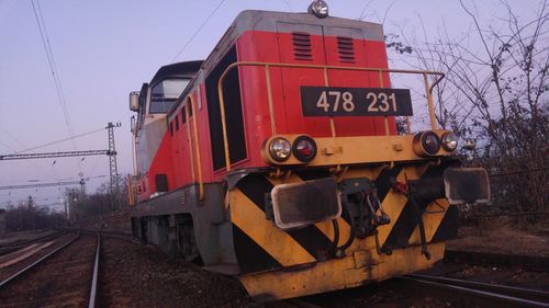 Train on railroad track against sky