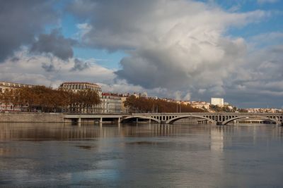 Bridge over river against sky