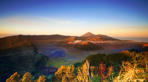 Scenic view of mountains against sky during sunset